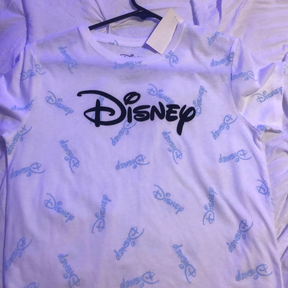 White Disney shirt.